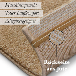{"class" => "product-thumbnails__image", "alt" => "Kurzflor Teppich Freja Sand Beige Detail der Rückseite mit sichtbarer Jute-Beschichtung"}