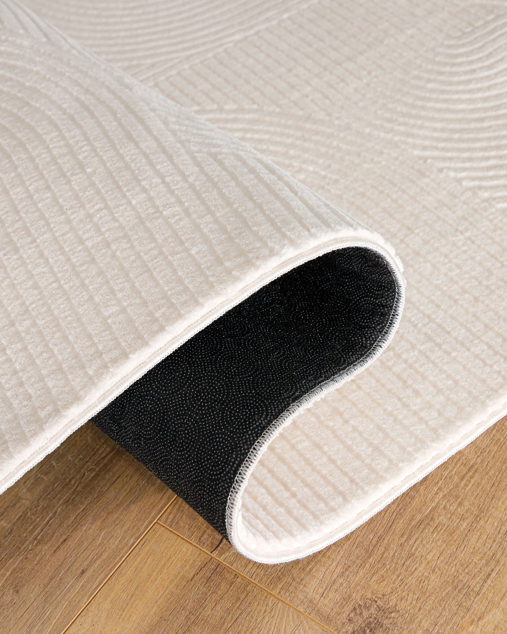 Detailansicht WECONhome Kurzflorteppich Nuuk Arc in Creme Weiß Antirutschrücken