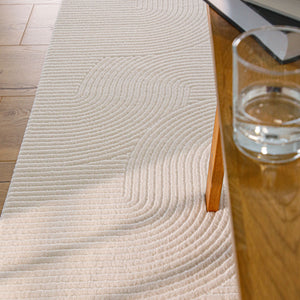 {"class" => "product-thumbnails__image", "alt" => "Detailansicht WECONhome Kurzflorteppich Nuuk Arc in Creme Weiß unter einem Holztisch mit einem Glas und Büchern darauf"}