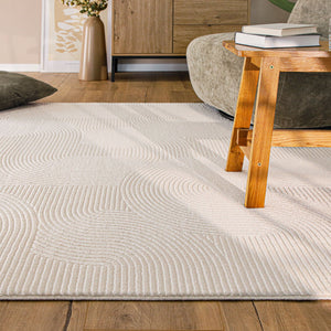 {"class" => "product-thumbnails__image", "alt" => "Moderner Kurzflorteppich Nuuk Arc in einem hell eingerichteten Wohnzimmer unter einem Holztisch mit einem Sessel"}