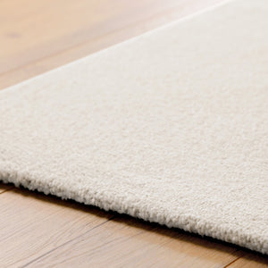 {"class" => "product-thumbnails__image", "alt" => "Kurzflor Teppich Vegas Creme Detail der Teppichkante auf Holzboden, flacher Abschluss und gleichmäßige Struktur"}