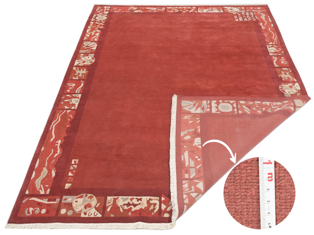 Handgeknüpfter tibetischer Teppich in rot mit Retro Bordüre – Neuwertig