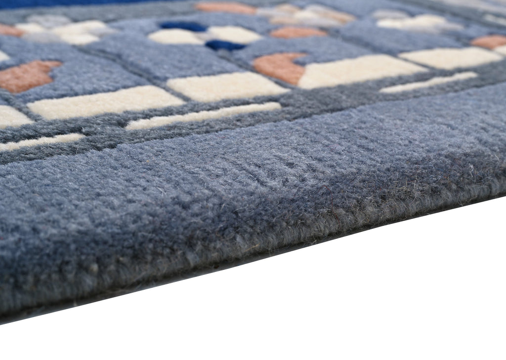 Handgeknüpfter Tibet Teppich in blau mit Retro-Bordüre – Neuwertig
