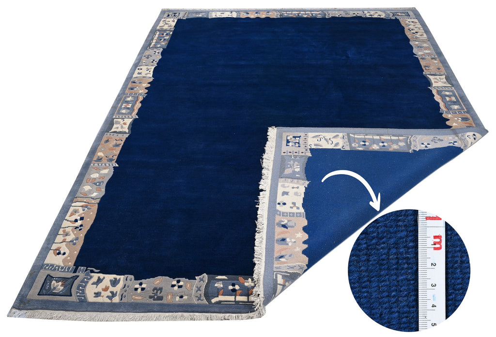 Handgeknüpfter Tibet Teppich in blau mit Retro-Bordüre – Neuwertig