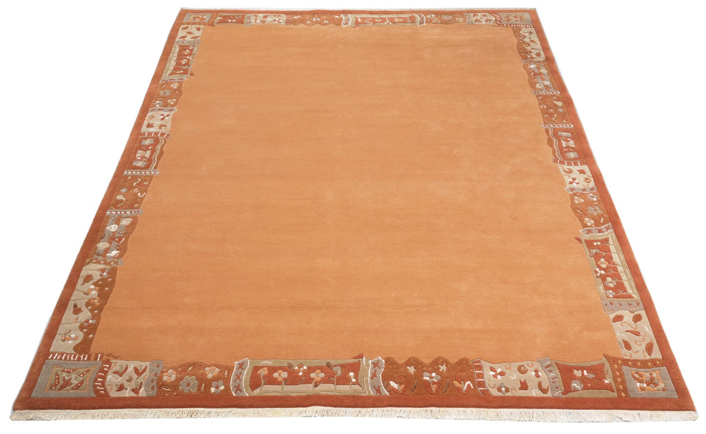 Handgeknüpfter Tibet Teppich in Apricot mit Retro Bordüre – Neuwertig