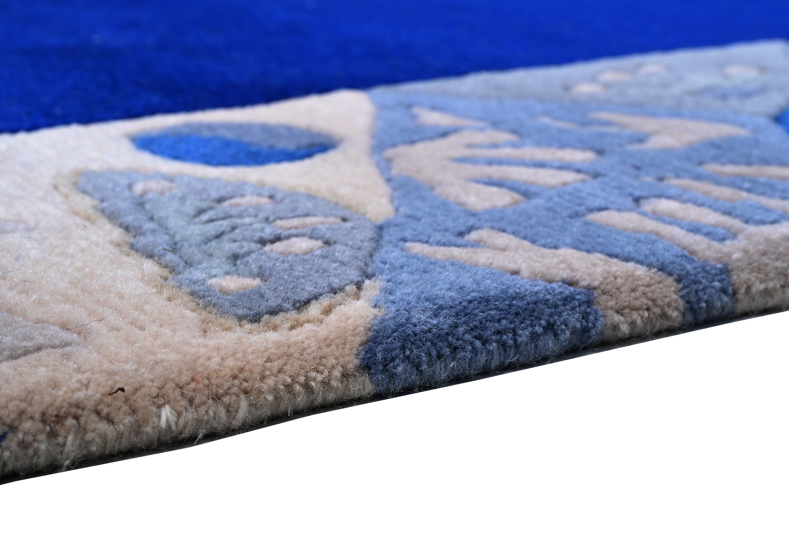Handgeknüpfter Tibeter Teppich in blau mit Retro-Bordüre – Neuwertig