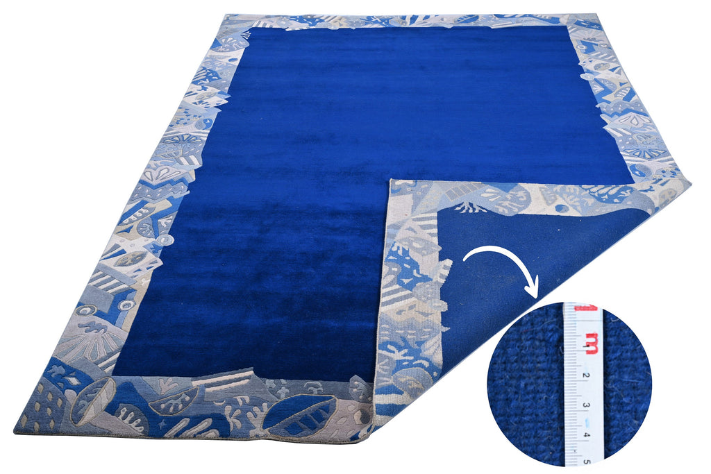 Handgeknüpfter Tibeter Teppich in blau mit Retro-Bordüre – Neuwertig