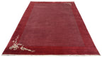 Handgeknüpfter Tibeter Teppich in red berry mit Retro Bordüre – Neuwertig