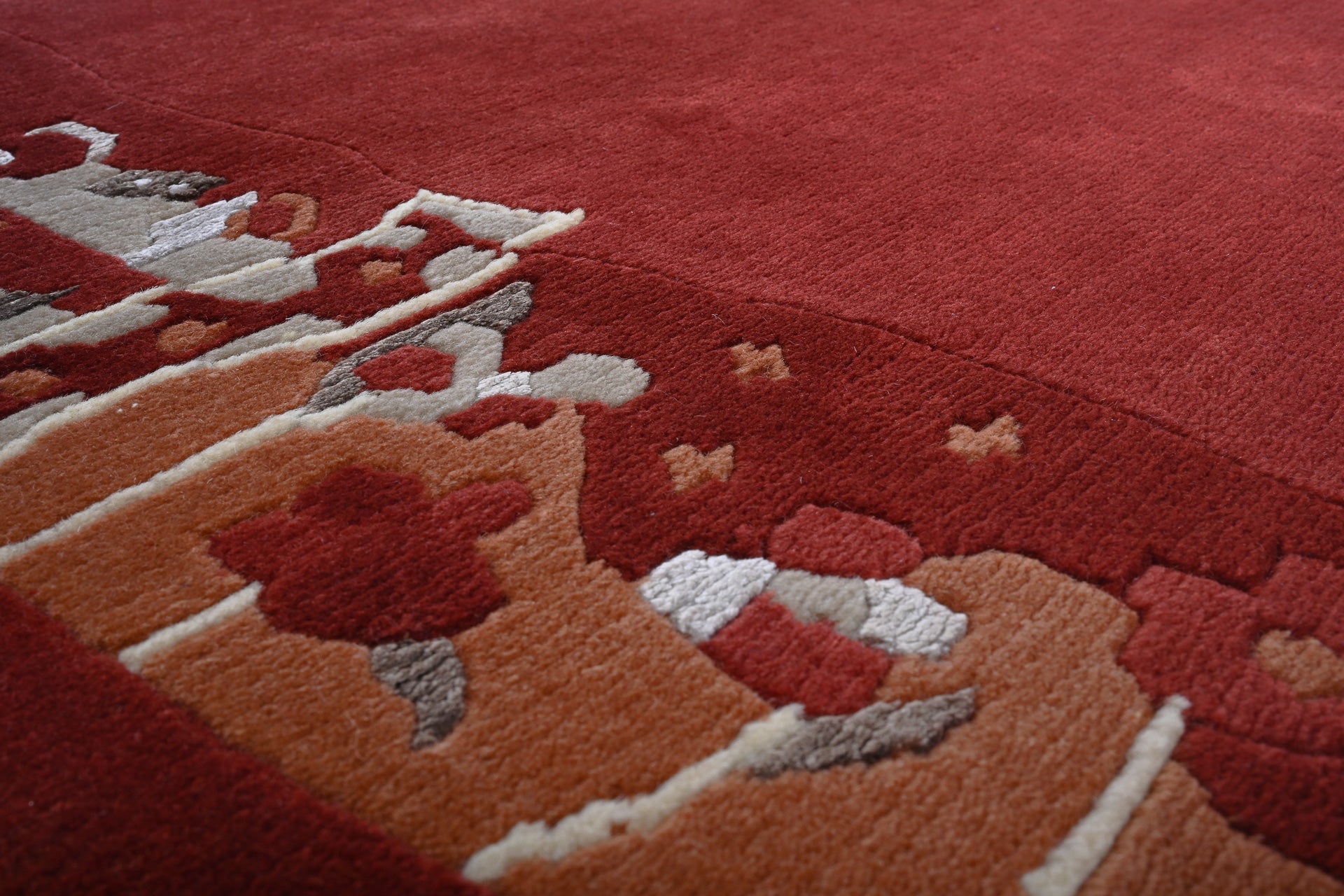 Handgeknüpfter Tibet Teppich rot mit Retro Bordüre – Neuwertig