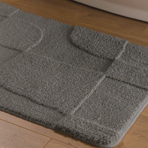 {"class" => "product-thumbnails__image", "alt" => "Badteppich von BathKing by WECONhome Davie Basalt Grau Video Nahaufnahme von Flor und Kante, Hand bewegt den Teppich und zeigt Materialstruktur"}