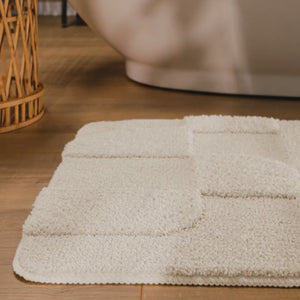 {"class" => "product-thumbnails__image", "alt" => "Badteppich von BathKing by WECONhome Davie Creme Weiß Video Nahaufnahme von Flor und Kante, Hand bewegt den Teppich und zeigt Materialstruktur"}