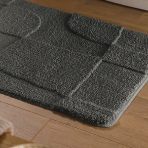 {"class" => "product-thumbnails__image", "alt" => "Badteppich von BathKing by WECONhome Davie Anthrazit Grau Video Nahaufnahme von Flor und Kante, Hand bewegt den Teppich und zeigt Materialstruktur"}