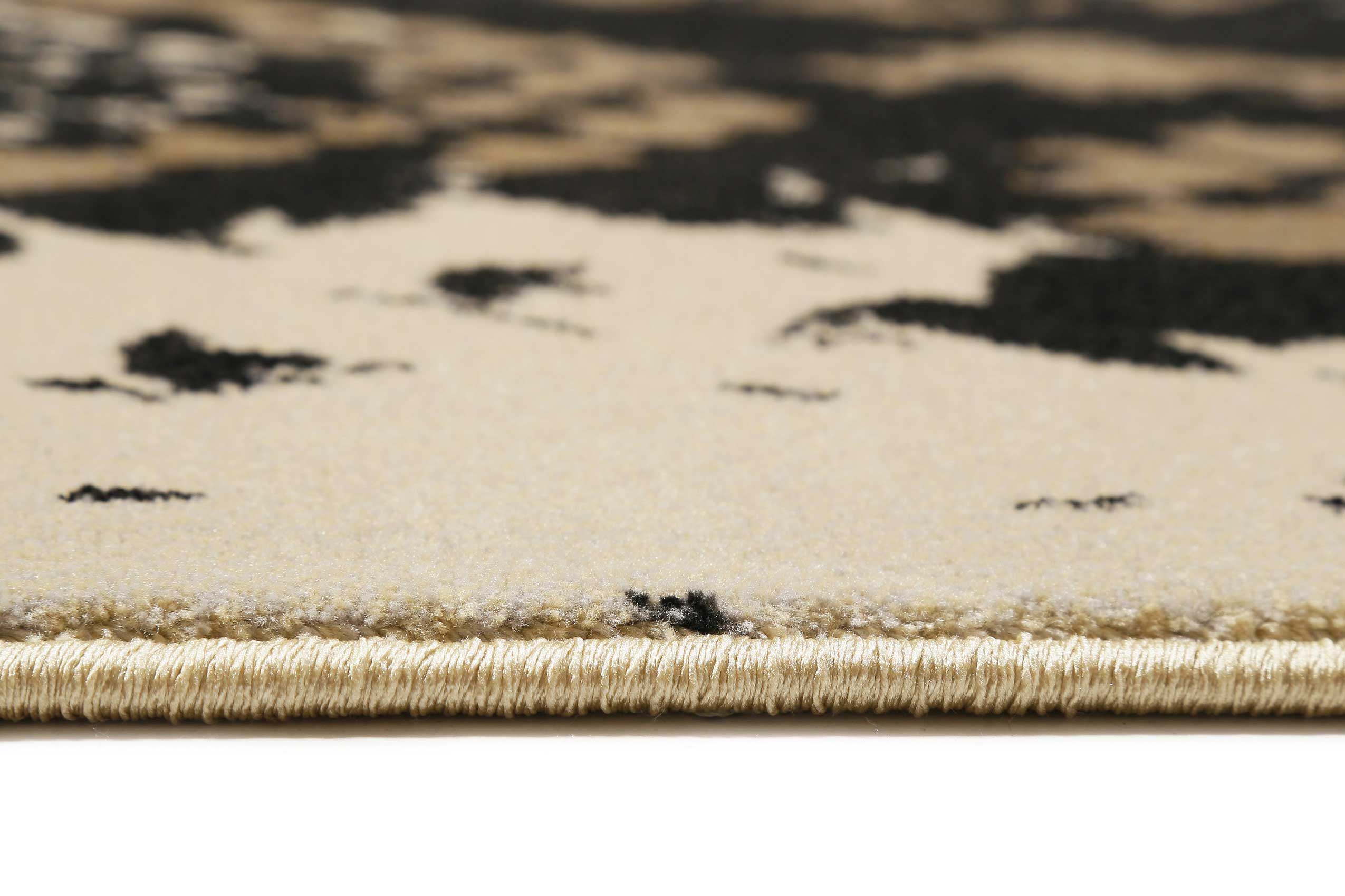 Teppich Animal Print Schwarz Beige Taupe "Phyton" WECONhome