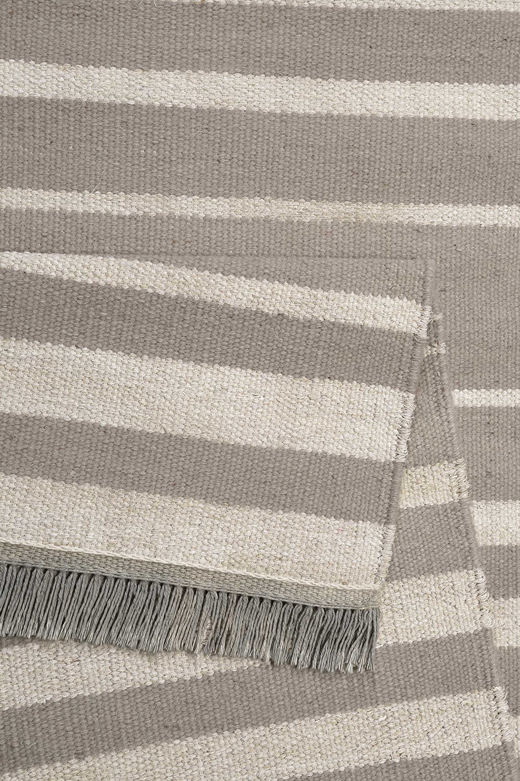 Kelim Teppich Taupe Beige aus Naturfaser "Skid Marks" WECONhome